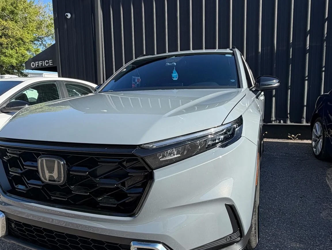 White Honda photographed outside AE Collision Center
